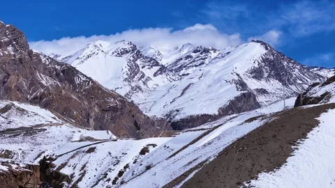 Aerial drone shot capturing the stillness of Pin Valley in deep winter, where Stock Footage 304945502