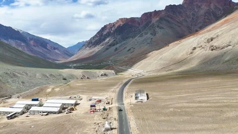 Aerial drone shot capturing the stunning, rugged landscape of Ladakh with its Stock Footage 310751671