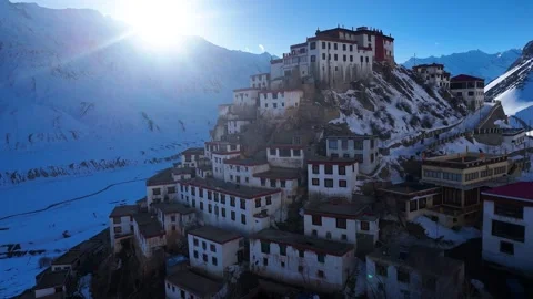 Aerial drone shot capturing the timeless beauty of Key Monastery in the golden Stock Footage 304955559