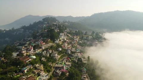 Aerial drone shot of cloud river forming in the mountains in the morning Stock Footage 296674240