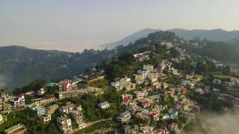 Aerial drone shot of cloud river forming in the mountains in the morning crowded Stock Footage 296674252