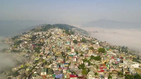 Aerial drone shot of cloud river forming in the mountains in the morning crowded Stock Footage 296674293