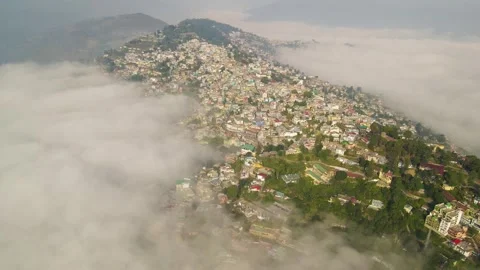 Aerial drone shot of cloud river forming in the mountains in the morning crowded Stock Footage 296674330