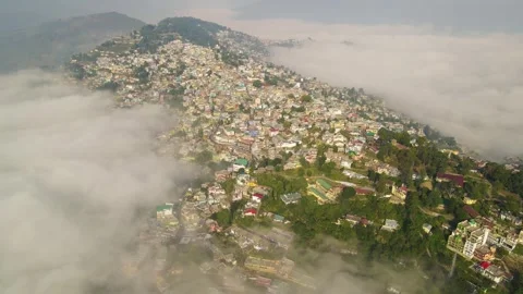 Aerial drone shot of cloud river forming in the mountains in the morning Stock Footage 296674366