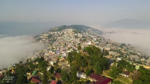 Aerial drone shot of cloud river forming in the mountains in the morning crowded Stock Footage 296674379