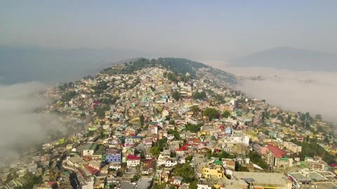 Aerial drone shot of cloud river forming in the mountains in the morning Stock Footage 296674404