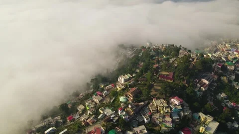 Aerial drone shot of cloud river forming in the mountains in the morning crowded Stock Footage 296674494