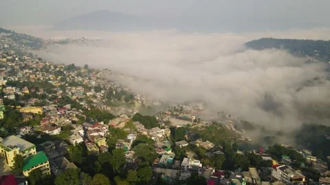 Aerial drone shot of cloud river forming in the mountains in the morning crowded Stock Footage 296674515