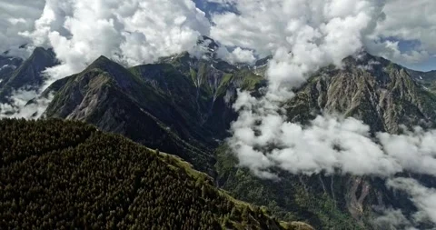 Aerial drone shot in the clouds form les 2 alpes in the French Alps Stock Footage 275346108