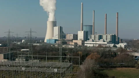 Aerial drone shot of coal fired power station during energy crisis and high Stock Footage 209279615