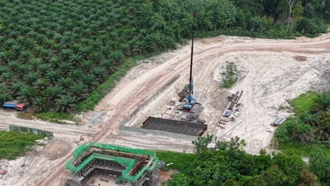 Aerial drone shot construction site workers heavy equipment Stock Footage 346345029