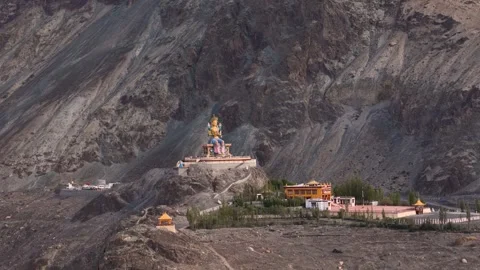 Aerial Drone shot of Diskit monastry buddha statue Video stock 293118313