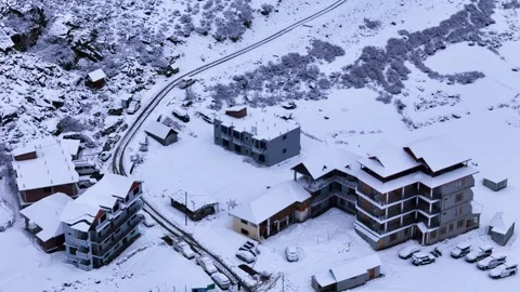 Aerial drone shot displaying a mesmerizing top-down view of a city buried under Stock Footage 304948751