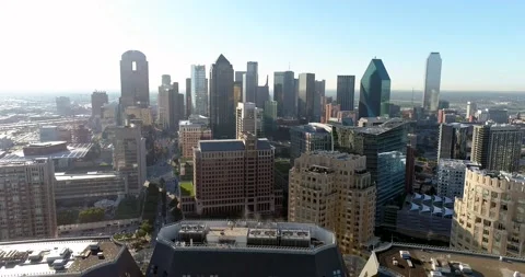 Aerial Drone shot of Downtown Dallas over the Crescent Building Stock Footage