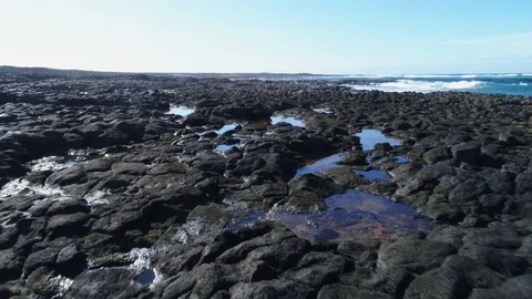 Aerial Drone Shot Of Dramatic Rocky Shore On Sunny Day Stock Footage 79646712
