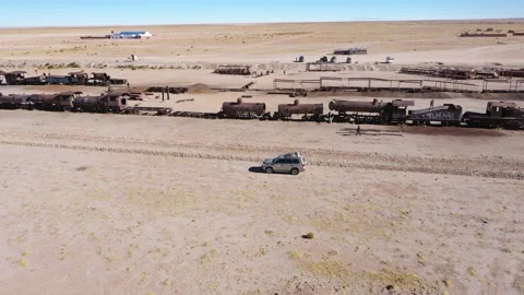 Aerial drone shot, Driving through train cemetary, Bolivia 4k stabilized Stock Footage 161705217