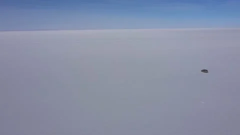 Aerial drone shot, Driving through Salar de Uyuni, Bolivia 4k stabilized Stock Footage 161705372