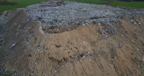 Aerial drone shot of the ecological damage. Drone flying around the urban refuse Stock Footage