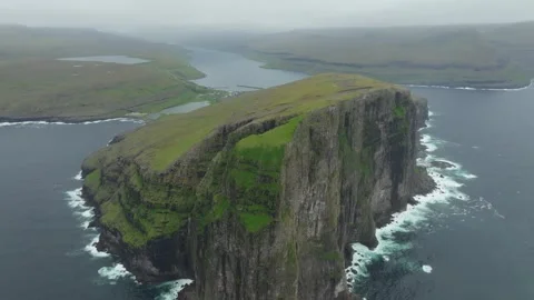 Aerial drone shot of Eiðiskollur mountain, Eiði on the Faroe Islands Stock Footage 337780252