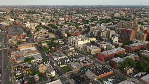 Aerial Drone Shot of Elevated Subway Train in Brooklyn New York Neighborhood Stock Footage 235502852