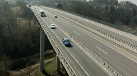 Aerial drone shot flight over Highway Bridge and River Stock Footage 48567982
