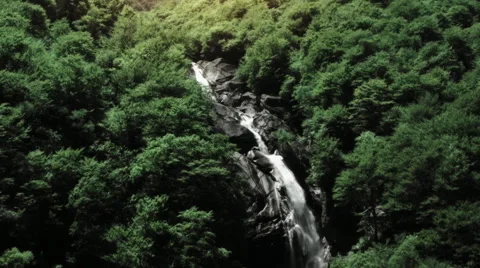 Aerial drone shot flight over Waterfall in Forest Stock Footage 48608939