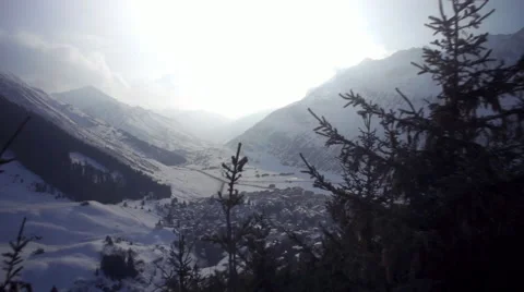 Aerial drone shot flight over Tree Village Andermatt Stock Footage 48610101