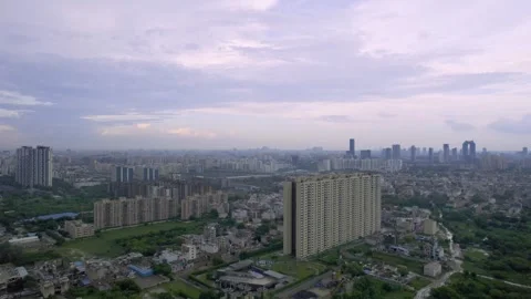 Aerial drone shot flying backward from under construction skyscrapers Stock Footage 318447783