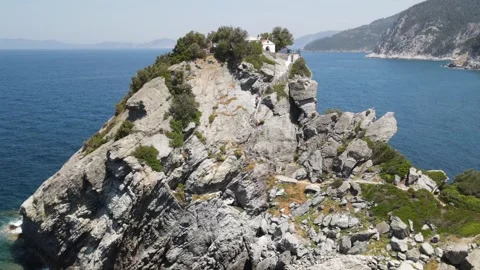 Aerial drone shot flying forward towards the famous Agios Ioannis Kastri chu Stock Footage 336915116