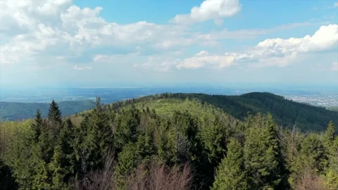 Aerial drone shot flying forward over forested hills of the Beskids mountains 库存影片 341511760