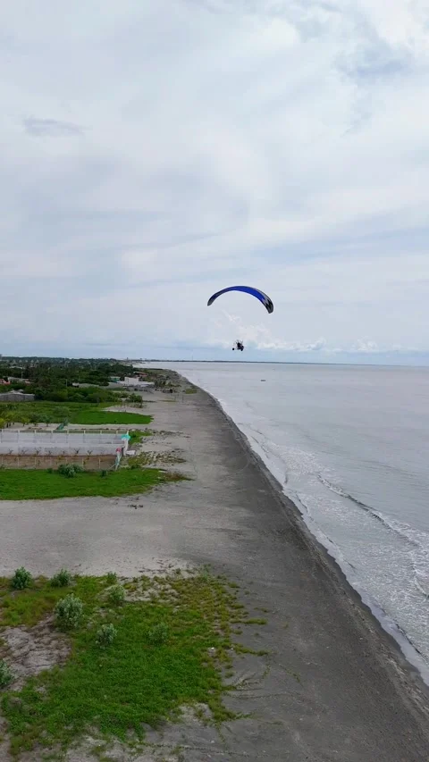 Aerial Drone Shot Of A Flying Paramotor Over the Caribbean coast Colombia Stock Footage 285161598