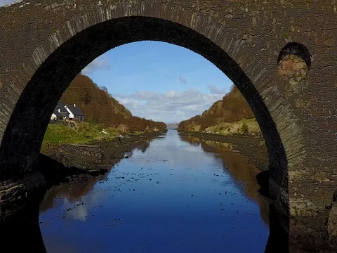 Aerial Drone Shot Flying Under the Bridge Over the Atlantic, Seil Island Video stock 80888320