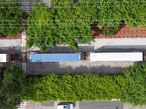 Aerial drone shot of freight train on tracks at England Avenue in Guadalajara Stock Photos