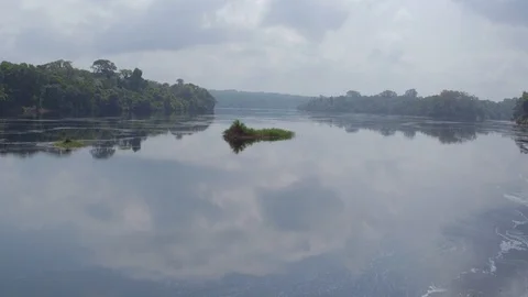 Aerial drone shot going forward over a Lake in Congo Stock-Footage 107902725