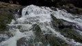 Aerial drone shot green rocky waterfall jungle valley in Bali 4k or 4k+ Resolution