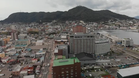 Aerial drone shot, Hakodate rooftops, Japan in 4K stabilized Stock Footage 107328746