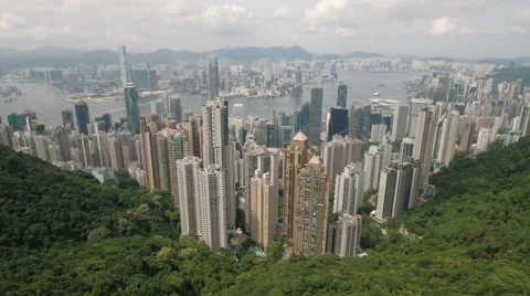 Aerial drone shot of high-rise commercial and residential buildings of Hong Kong Stock Footage