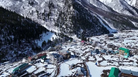 Aerial drone shot highlighting the pristine beauty of Chitkul in winter, where Video stock 304947429