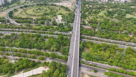 Aerial drone shot highlighting the structured and spacious road network in Noida Stock Footage 312488399