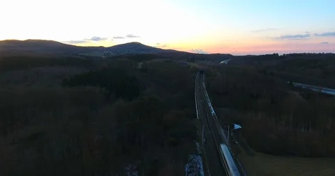 Aerial Drone shot of Highspeed train ICE over german bridge Sunset Stock Footage 86996801