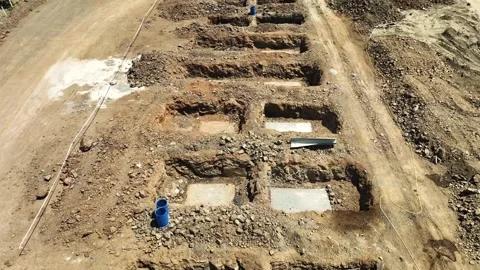Aerial drone shot of huge construction site. working on foundation. buildin.. Stock Footage 285933161
