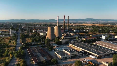 Aerial Drone Shot of Industrial Complex and Power Plant at Sunset Vídeo Stock 345144469