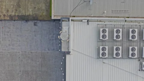 Aerial Drone Shot of Industrial Data Center Roof with HVAC Systems and Cooling 库存影片 341501818