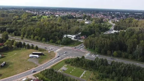 Aerial drone shot of an intersection in a rural village Video stock 163126071