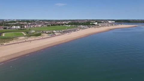 Aerial Drone Shot of Long Sandy Beach and Blue Sea in South Shields Video stock 336387546