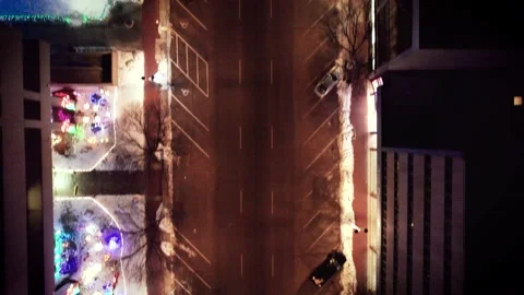 Aerial Drone shot Looking Down along the Christmas avenue at midnight Stock Footage 221883855