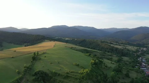 Aerial, drone shot of meadows under the mountains, Low Tatras Stock Footage 146436289