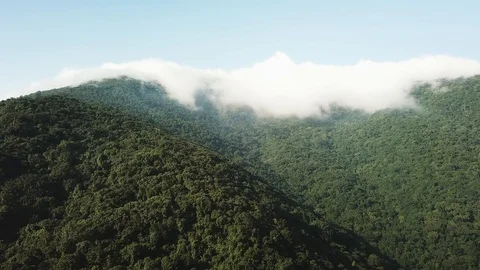 Aerial drone shot of mountain range with clouds, Da Nang, Vietnam 스톡 동영상 92354319