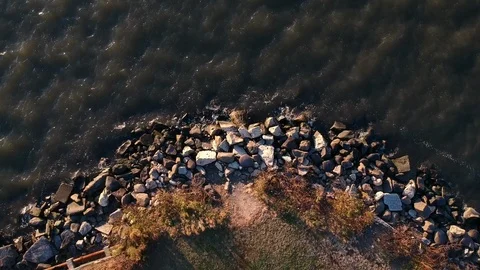 Aerial drone shot of moving water with rocks Stock Footage