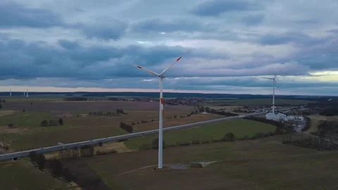 Aerial drone shot of moving wind turbine Stock Footage 159672949